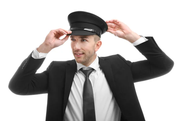 Young chauffeur adjusting hat — Stock Photo, Image