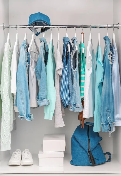 Clothes hanging on rack — Stock Photo, Image