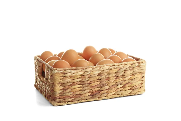 Square basket with brown eggs — Stock Photo, Image