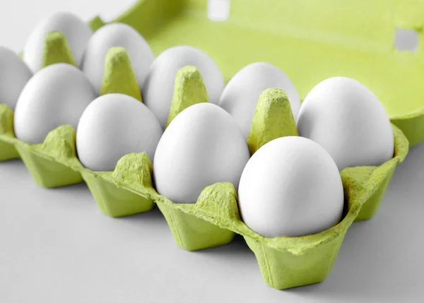 Raw eggs in package — Stock Photo, Image