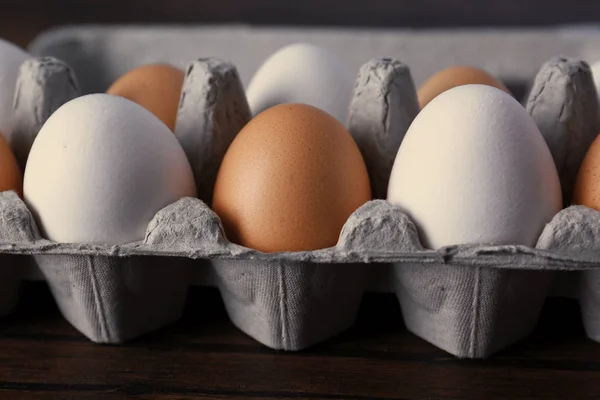 Raw eggs in package — Stock Photo, Image