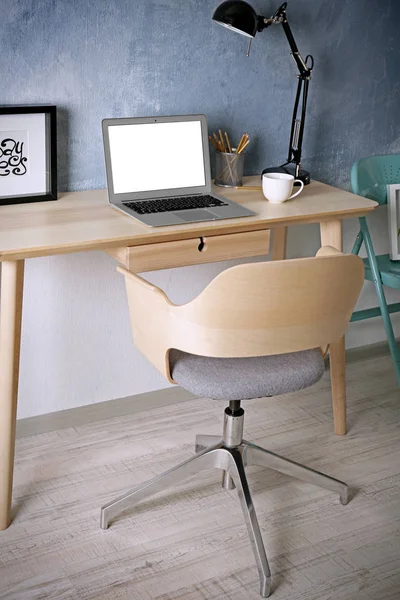 Workplace with laptop on table — Stock Photo, Image