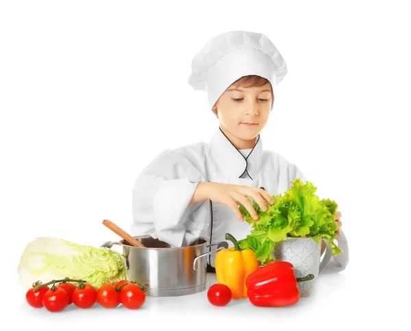 Schattige jongen in uniform van de chef-kok — Stockfoto