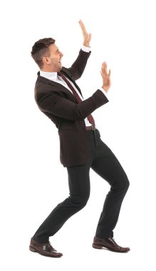 işadamı iterek görünmez bir duvar