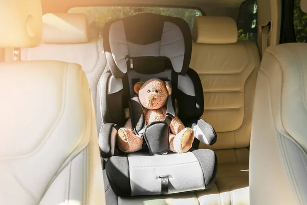 Safety car seat for baby  with teddy bear — Stock Photo, Image