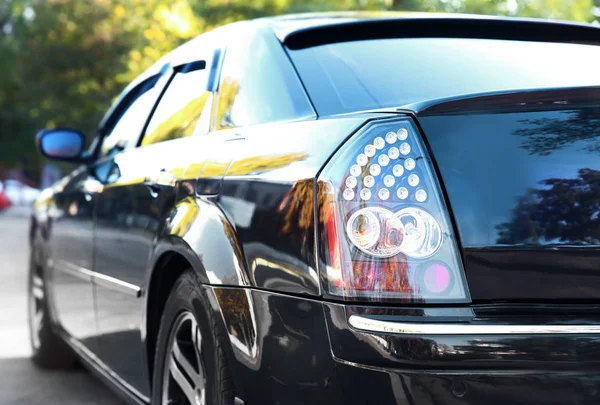 Closeup of luxury black car, outdoors — Stock Photo, Image