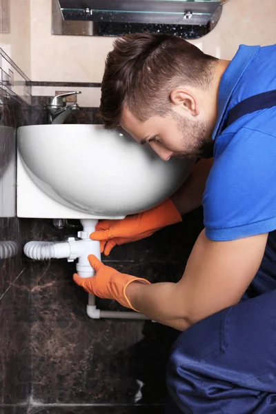 Plumber Repairing Sink Pipe Bathroom — Stock Photo, Image