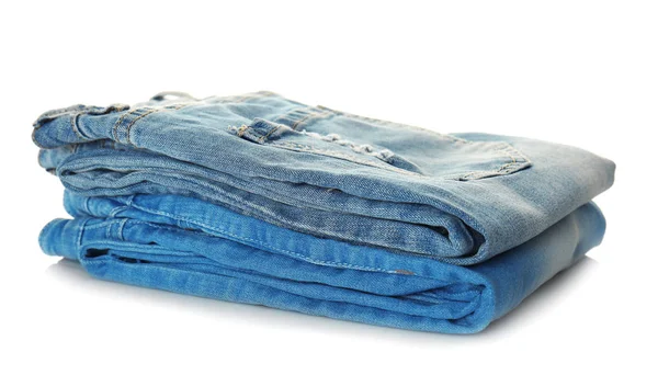Stack of jeans on white — Stock Photo, Image