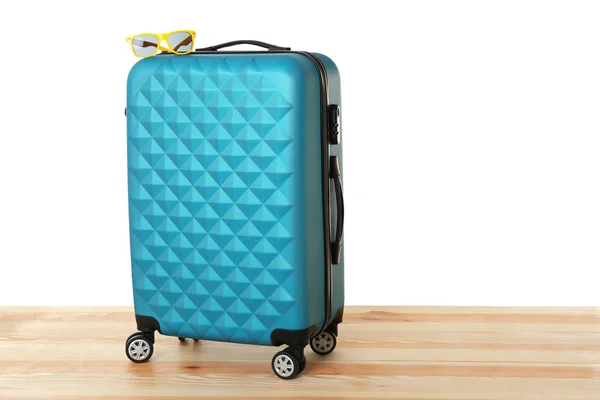 Blue traveler case with sunglasses — Stock Photo, Image