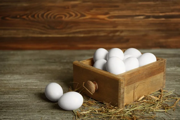 Raw eggs in drawer — Stock Photo, Image