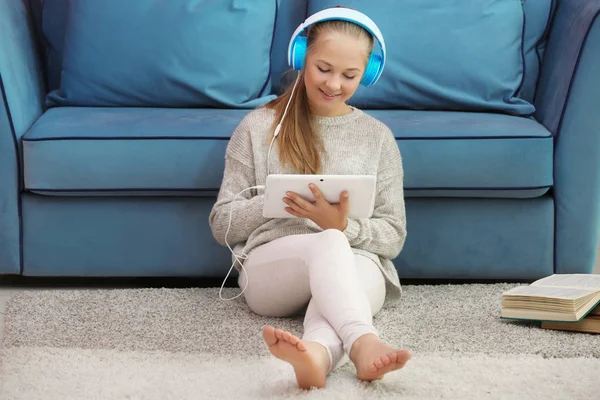 Cute teenager with tablet — Stock Photo, Image