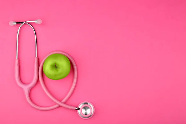 Stethoscope with apple composition — Stock Photo, Image