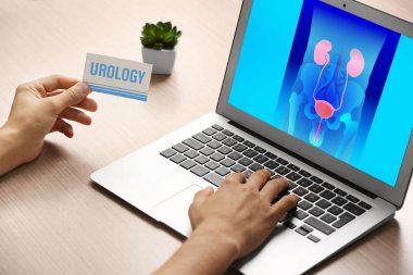 Man searching internet information about urology clipart