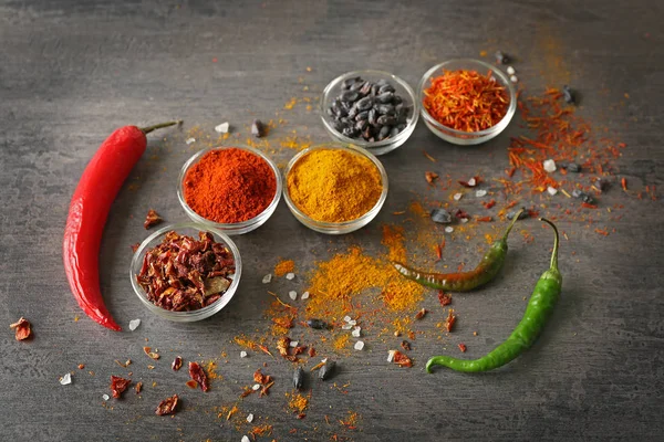 Aromatic spices in glass bowls — Stock Photo, Image