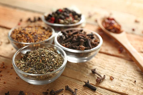 Aromatic spices in glass bowls — Stock Photo, Image