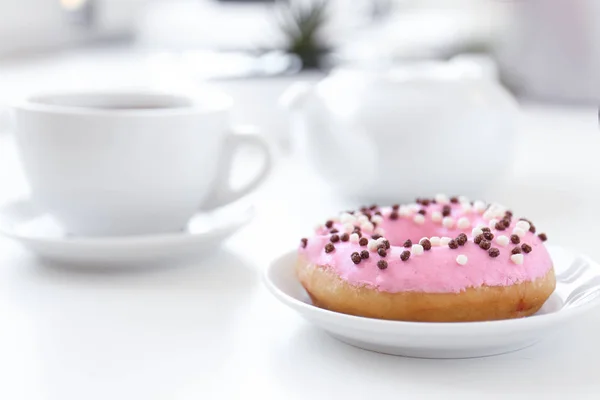 Delicious donut on saucer — Stock Photo, Image