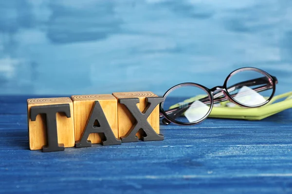 Cubes with word TAX — Stock Photo, Image