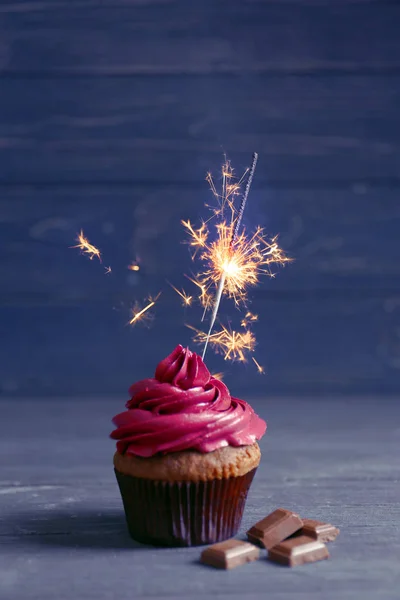 Birthday cupcake with sparkler — Stock Photo © belchonock #120602636