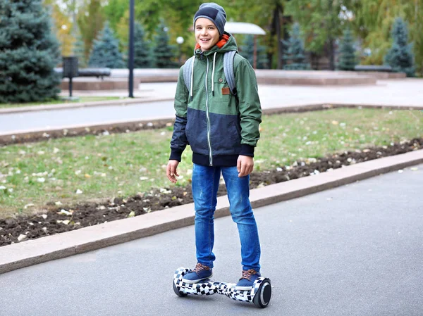 Teenager riding on gyroscooter — Stock Photo, Image