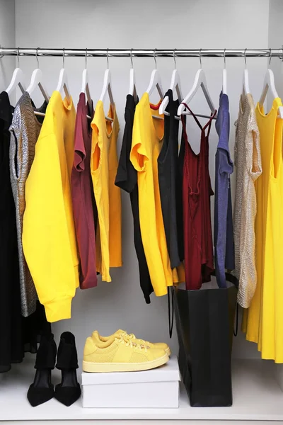 Collection of clothes hanging — Stock Photo, Image