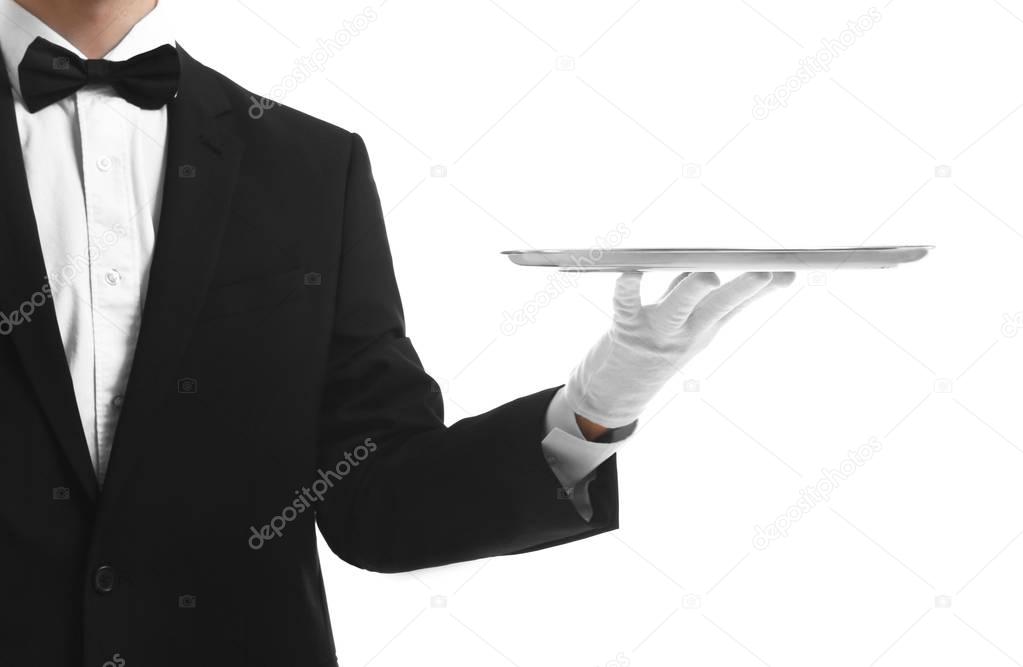 Waiter holding empty silver tray 