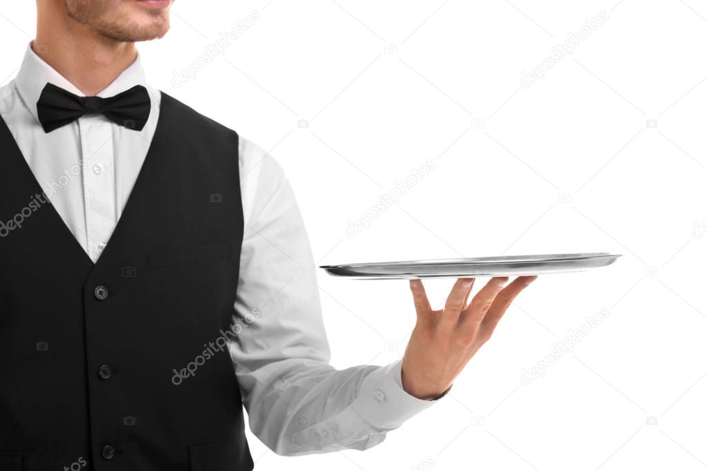 Waiter holding empty silver tray 