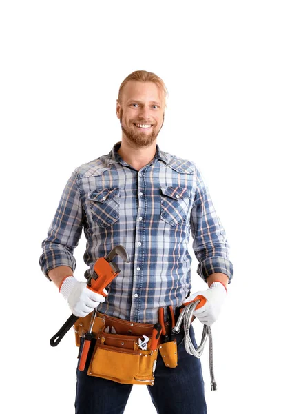 Handsome plumber with pipe wrench — Stock Photo, Image