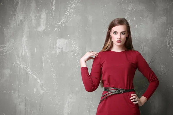 Attractive woman in red gown — Stock Photo, Image