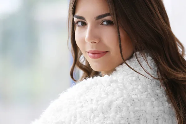 Beautiful woman near window — Stock Photo, Image