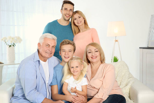 Happy family gathered in living room