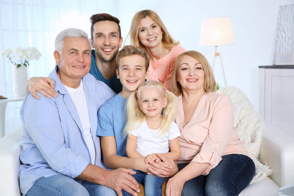 Happy family gathered in living room