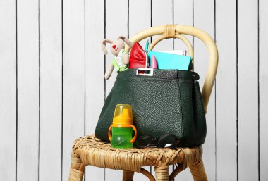 Maternity concept with handbag  clipart