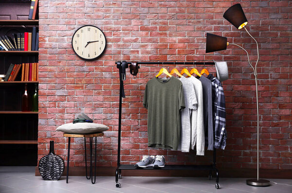 stylish shirts on hanger stand