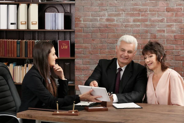 Senior couple at notary office