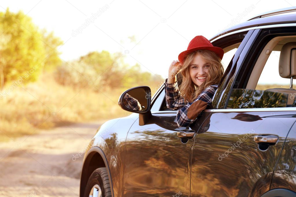 female driver in car