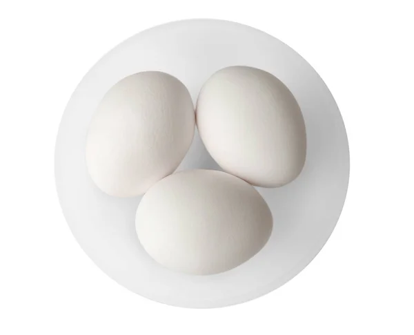 Ovos crus em prato — Fotografia de Stock
