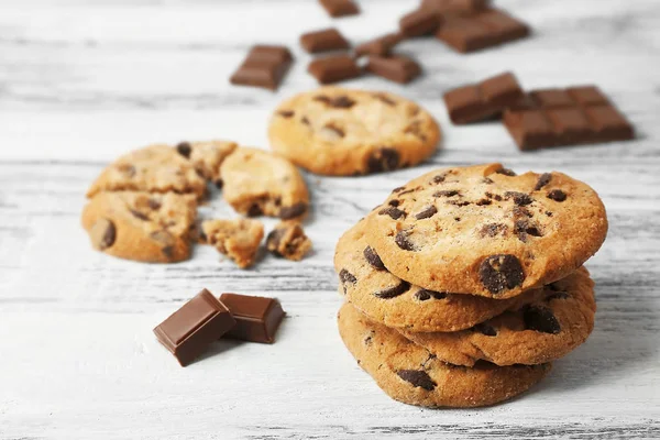 Chocolate cookies on wooden table — Stock Photo, Image