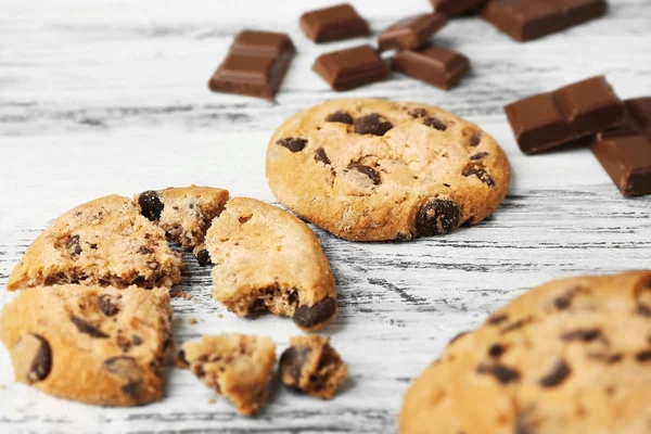 Chocolate cookies on wooden table — Stock Photo, Image