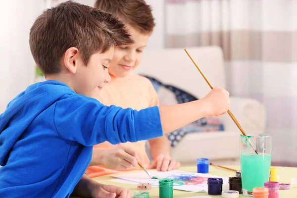 Cute little boys drawing pictures — Stock Photo, Image