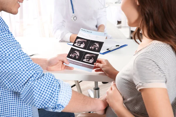 Future parent with doctor at the hospital