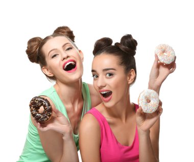 women with tasty donuts