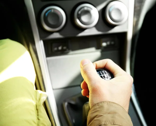 Male hand on transmission — Stock Photo, Image