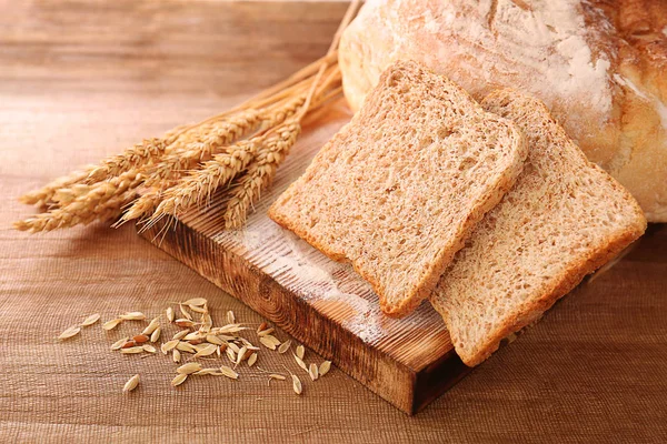 Sliced bread with wheat spikes