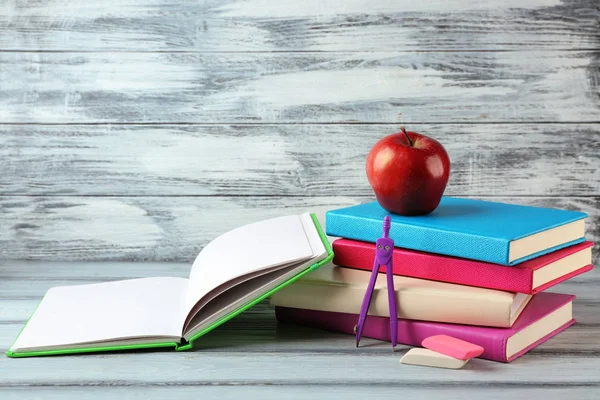 Books, apple and accessories — Stock Photo, Image