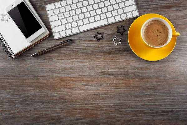 Workplace with cup of coffee — Stock Photo, Image