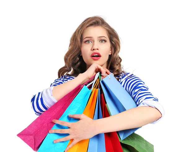 Woman with shopping bags on white — Stock Photo, Image
