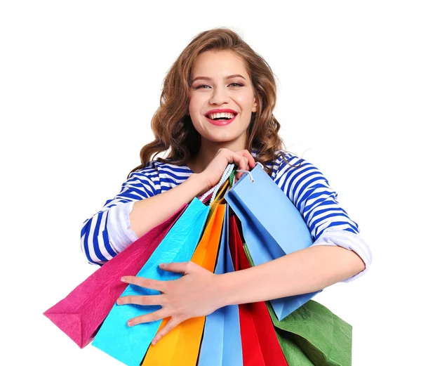 Vrouw met boodschappentassen op wit — Stockfoto