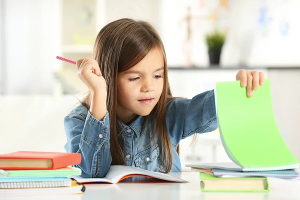 Little girl with books — Stock Photo, Image