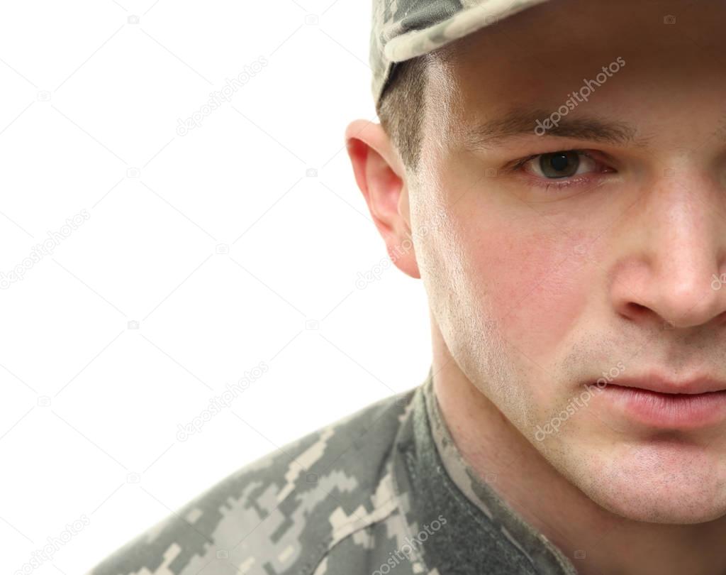 Soldier in camouflage on white  