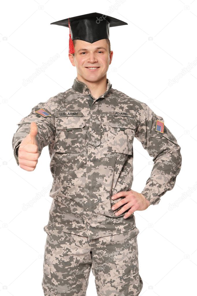 Soldier wearing graduation cap, on white background